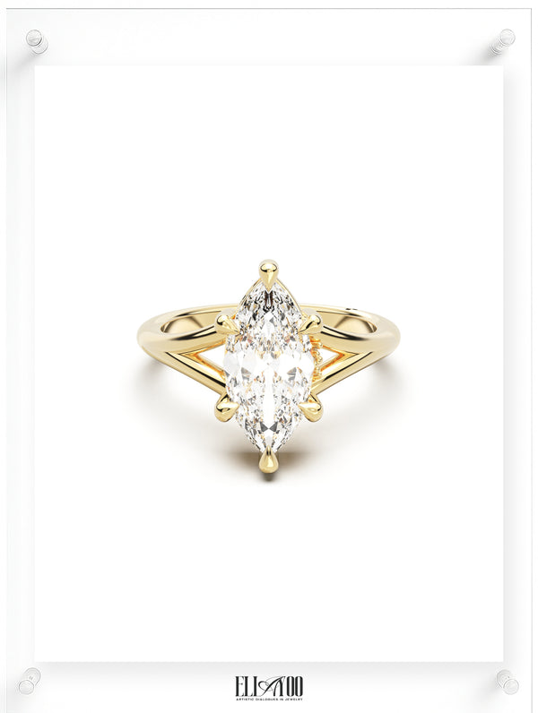 Front view of Marquise Cut Diamond Ring with claw setting featuring initials on the side