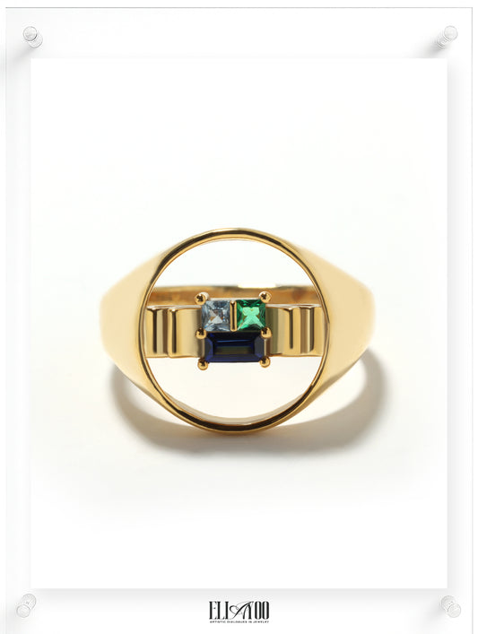 Front image of signet 10k gold ring featuring ribbon shape with Blue Spphire, Emerald, and Aquamarin