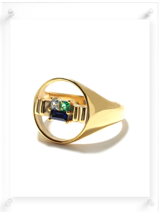 Side image of signet 10k gold ring featuring ribbon shape with Blue Spphire, Emerald, and Aquamarin