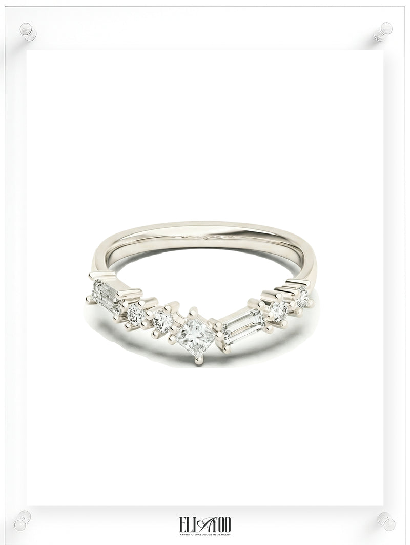 geometrically curved diamond wedding band in white gold, featuring a unique cluster of baguette, princess, and round brilliant cut diamonds.