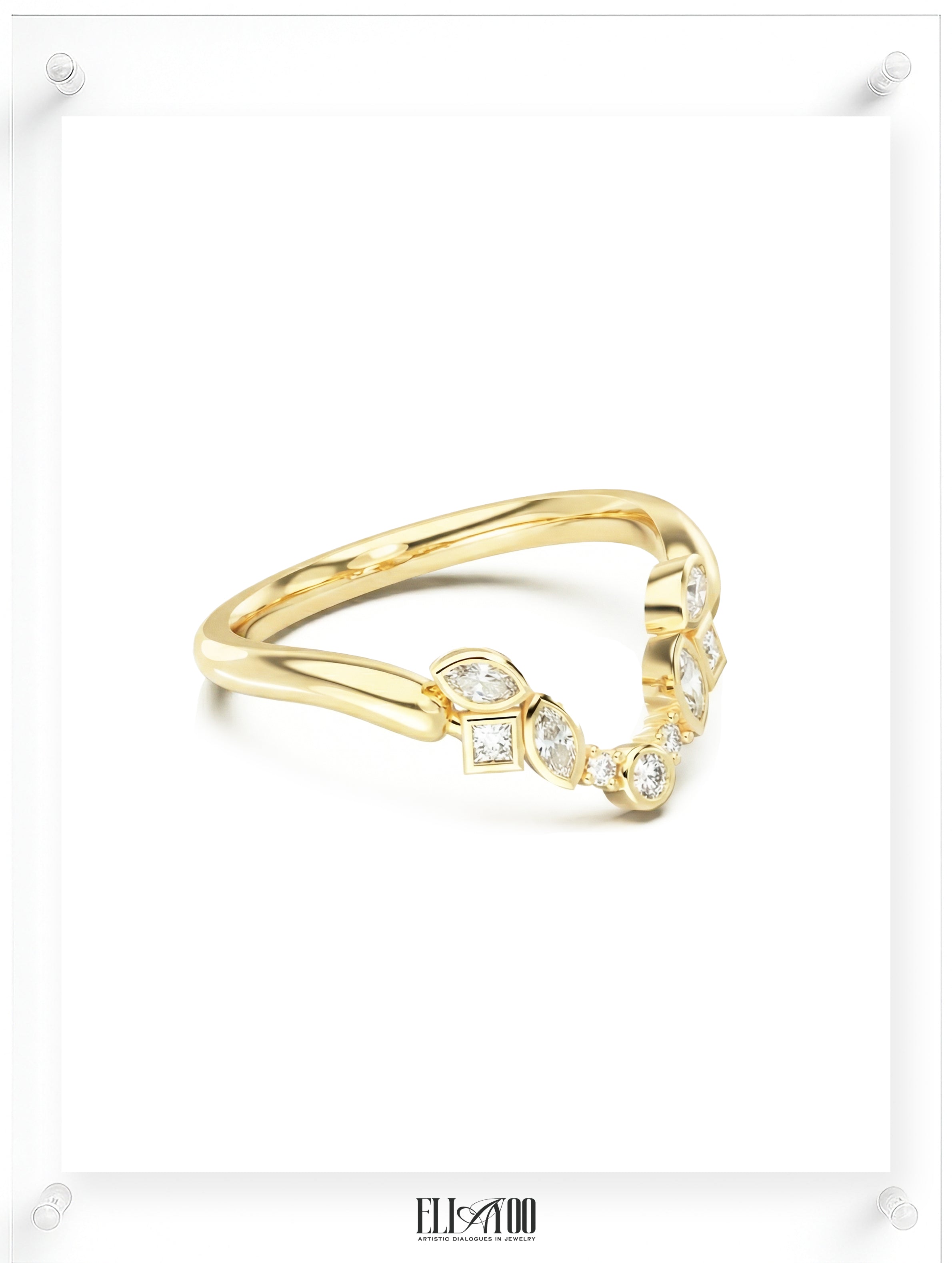 Angled view of a yellow gold V-shaped diamond ring with marquise-cut, princess-cut, and round-cut diamonds, highlighting the sculptural band and delicate fine jewelry detailing by Ella Yoo Jewelry
