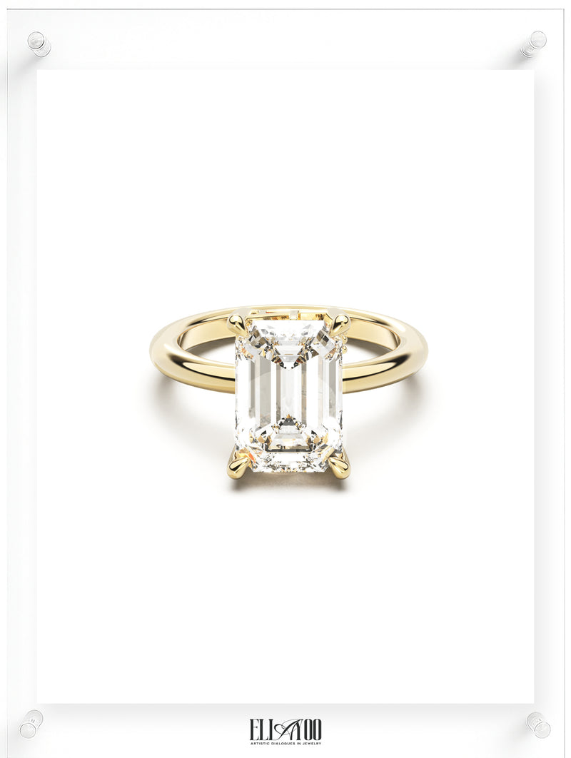 Front view of Radiant Cut Diamond Ring with claw setting featuring initials on the side