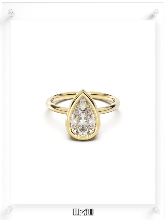 Front view of Pear Cut Diamond Ring with bezel setting featuring initials on the side