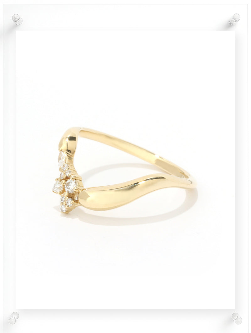 Contemporary yellow gold open ring with clustered diamond accents, side view