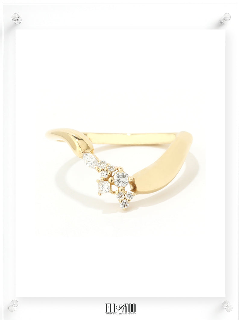 Contemporary yellow gold open ring with clustered diamond accents, modern fine jewelry design