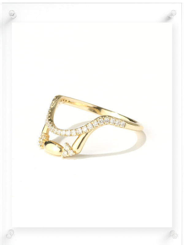 Contemporary yellow gold open ring with pavé diamond details, side view