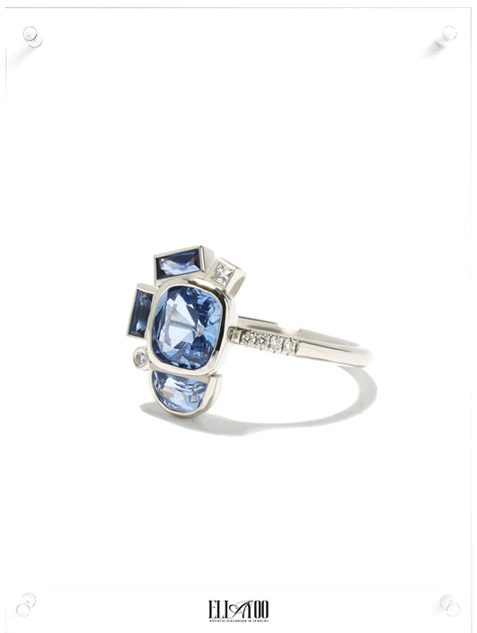 Side shot of Contemporary bauhaus design blue sapphire ring in platinum