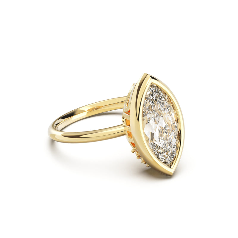 Side view of Marquise Cut Diamond Ring with bezel setting featuring initials on the side