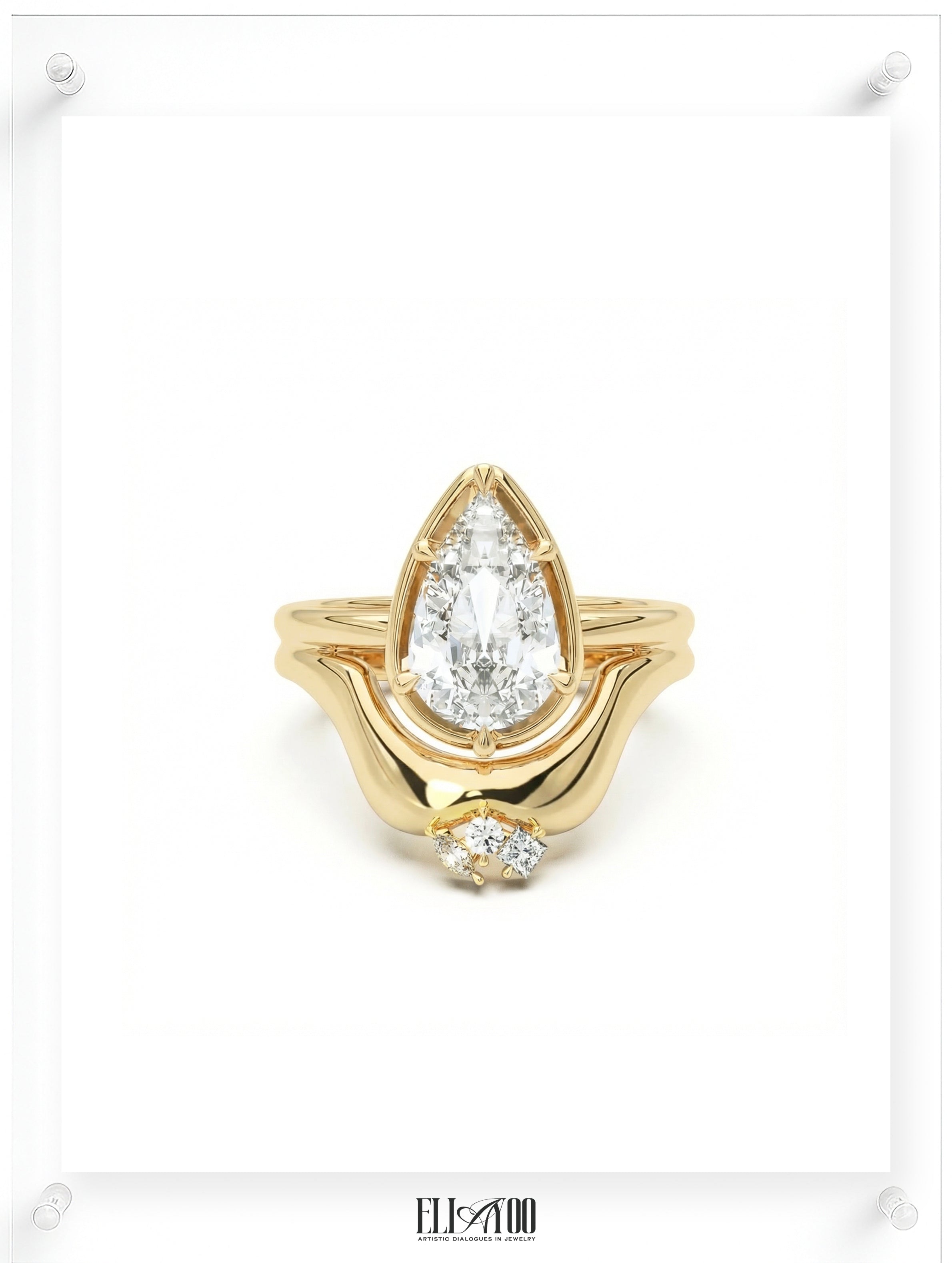 Yellow gold pear-shaped diamond ring with a sculptural flowing setting, soft natural light, front shot