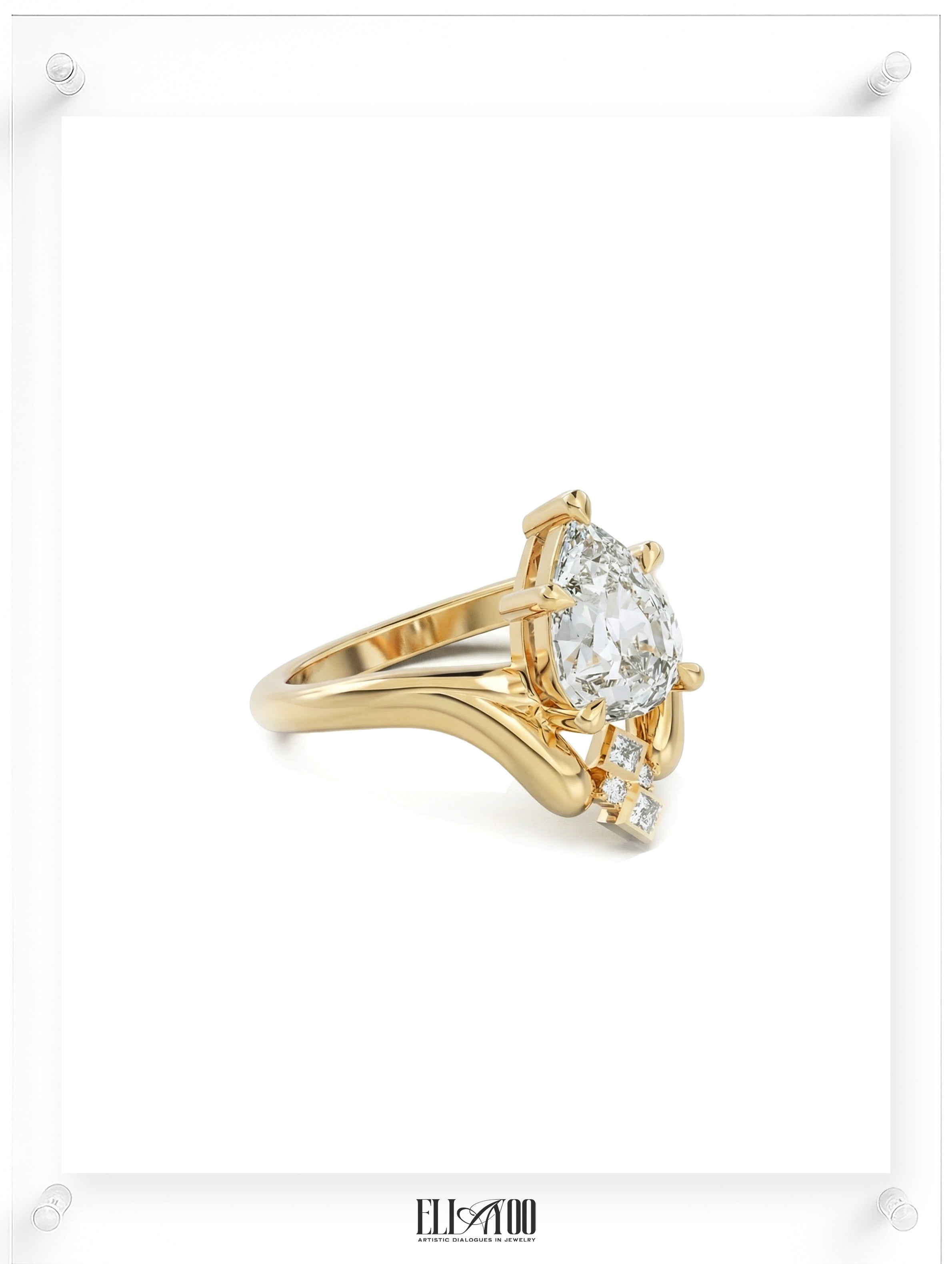 Side shot of 14k Yellow Gold Pear cut Diamond Ring with guard stone detail