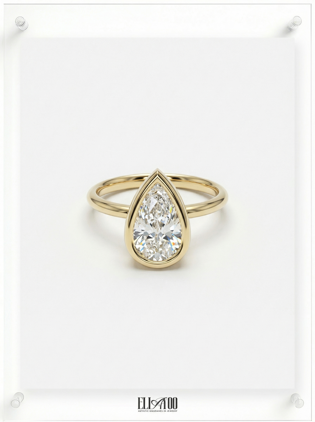 Front view of Pear Cut Diamond Ring with bezel setting featuring initials on the side