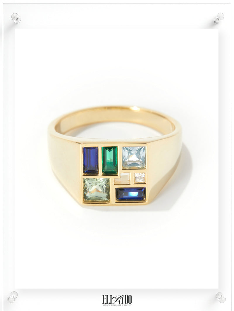 14k Plated Gold ring with colorful gemstones on a white background