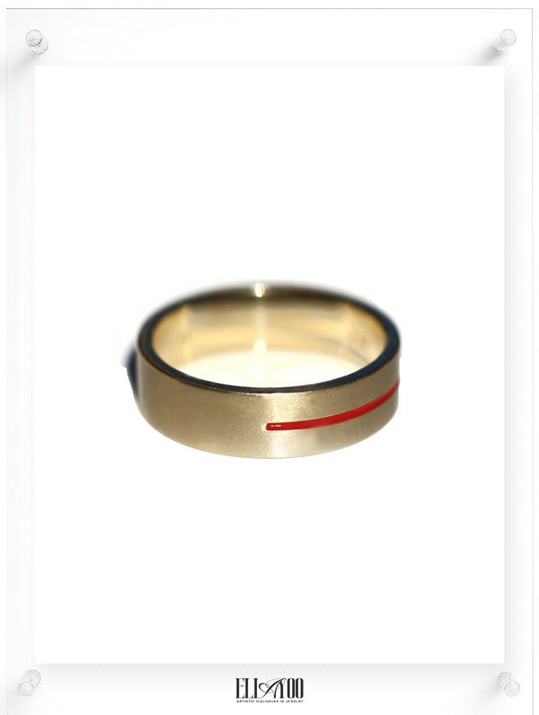 Men's Gold ring with a red stripe on a white background
