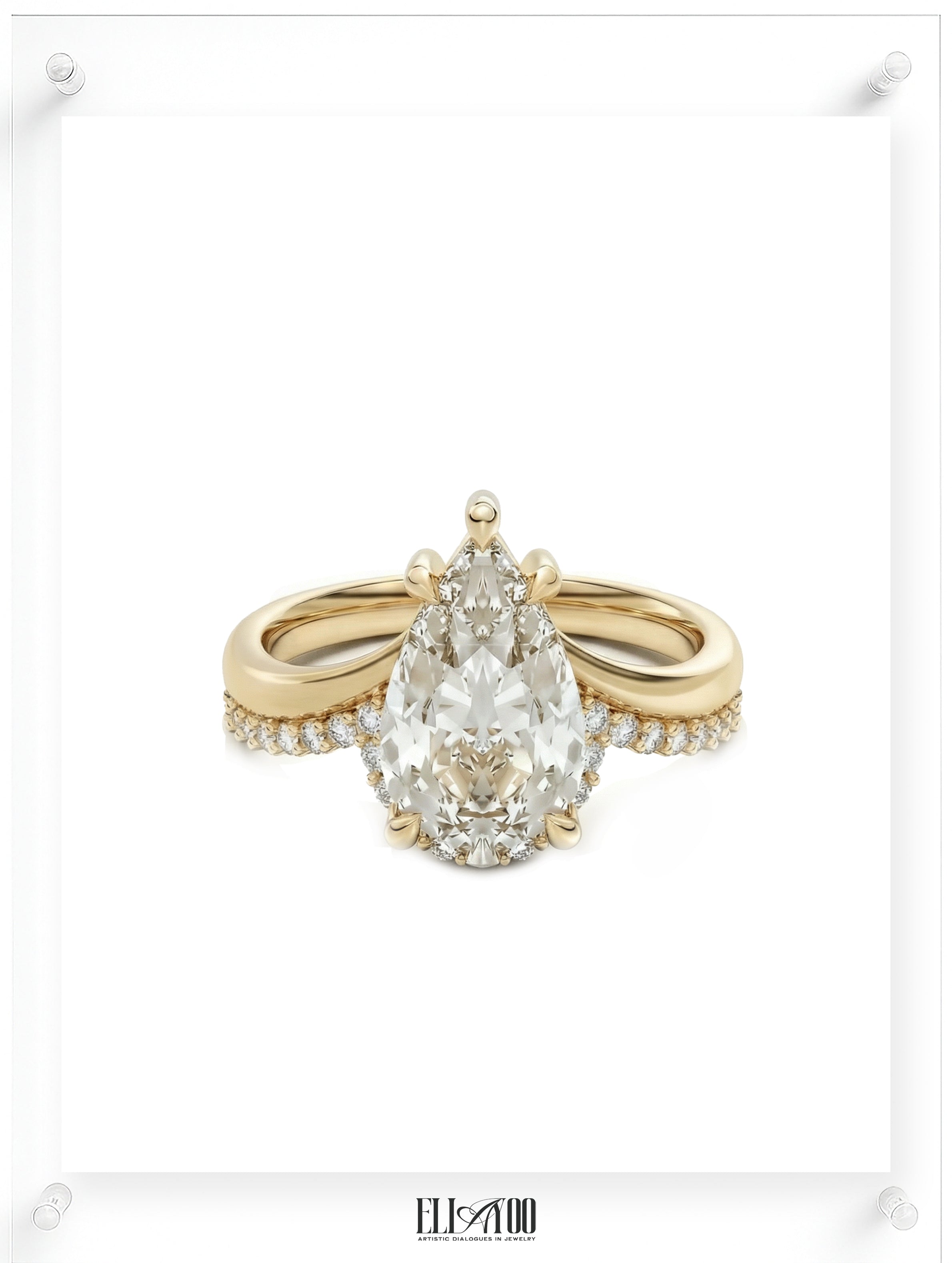 Pear cut diamond engagement ring with pavé band in 14k yellow gold, front shot