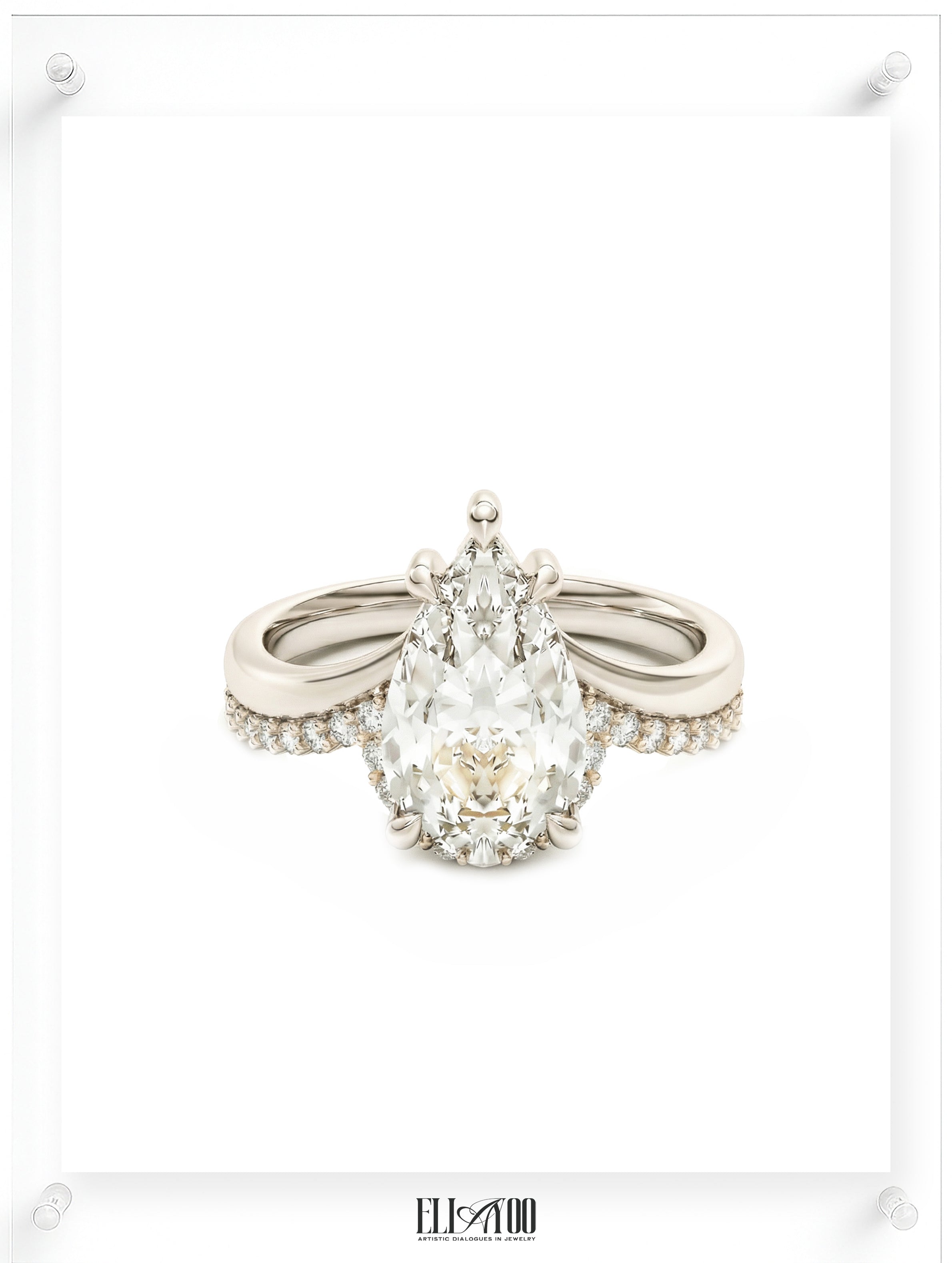 Pear cut diamond engagement ring with pavé band in 14k white gold, front shot