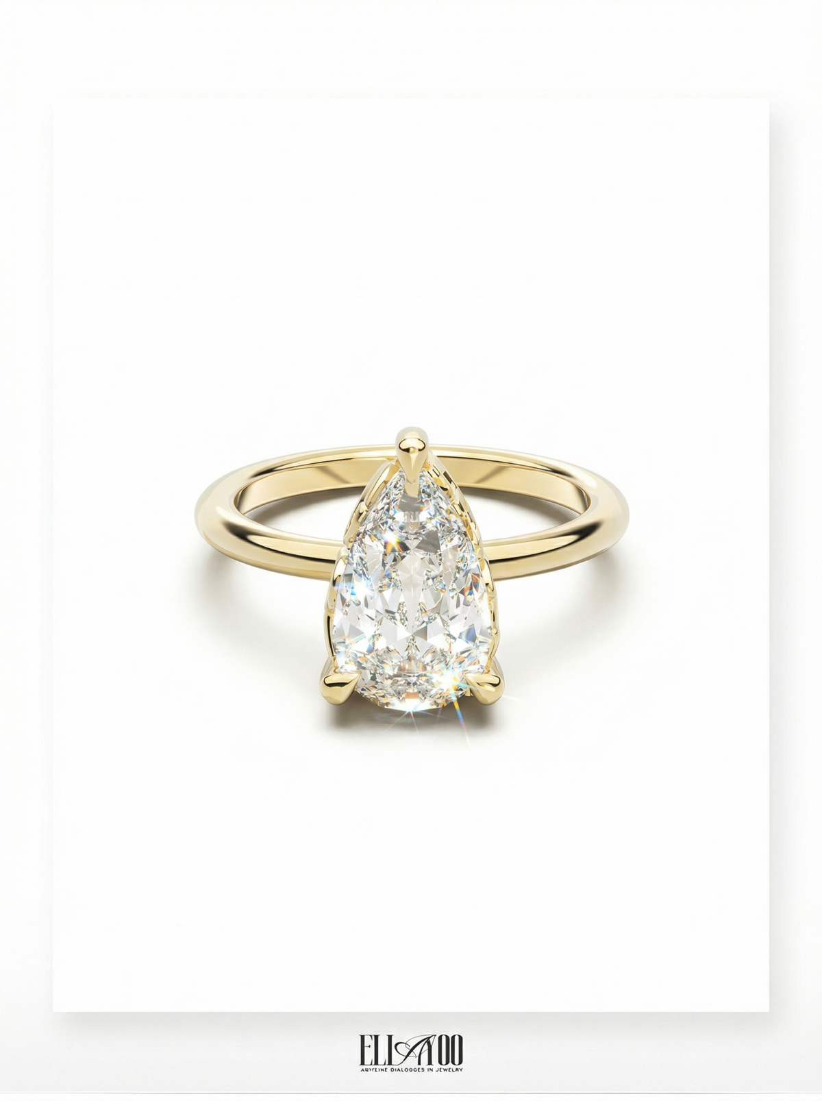 Front view of Pear Cut Diamond Ring with claw setting featuring initials on the side