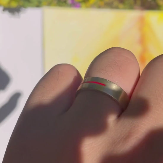 Model wearing Men's Gold ring with a red stripe
