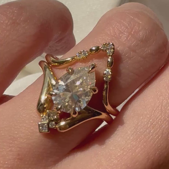 Video showing the engagement ring on model's hand